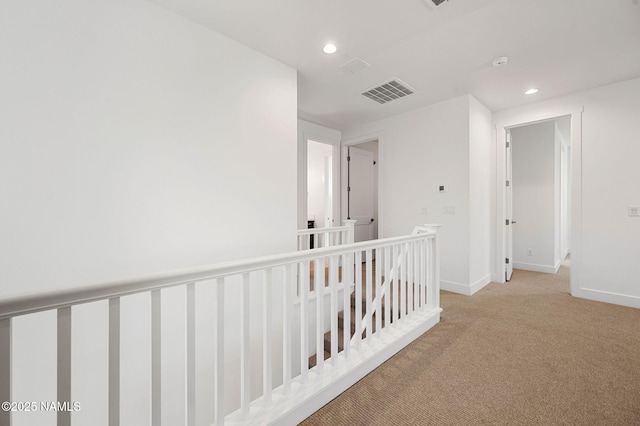 555 N Valerian Ln Lot 24, Flagstaff, AZ 86004 - hall with an upstairs landing, light colored carpet, recessed lighting, and baseboards