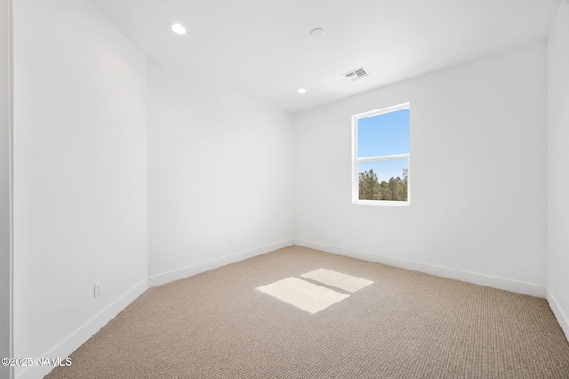 555 N Valerian Ln Lot 24, Flagstaff, AZ 86004 - empty room with light colored carpet, baseboards, and recessed lighting