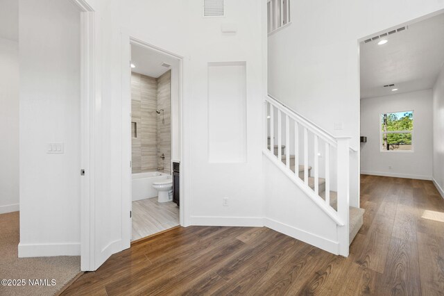 555 N Valerian Ln Lot 24, Flagstaff, AZ 86004 - stairway featuring wood finished floors, baseboards, and recessed lighting
