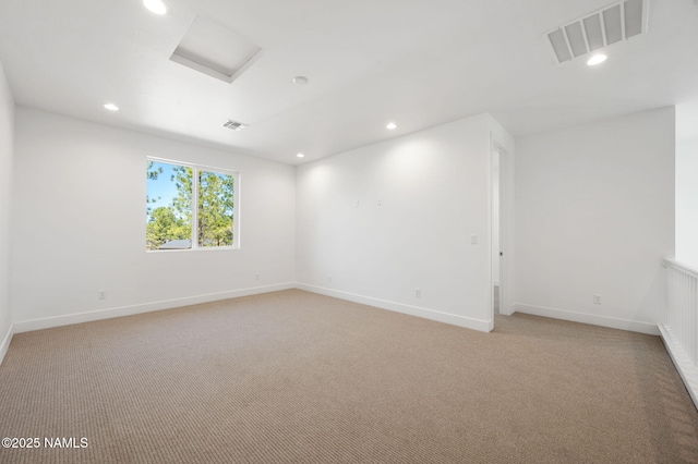 555 N Valerian Ln Lot 24, Flagstaff, AZ 86004 - empty room with light colored carpet, recessed lighting, baseboards, and attic access