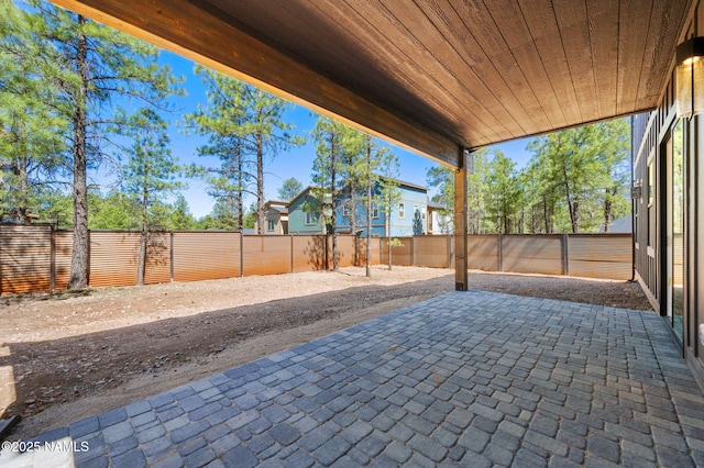 555 N Valerian Ln Lot 24, Flagstaff, AZ 86004 - fenced backyard with a patio