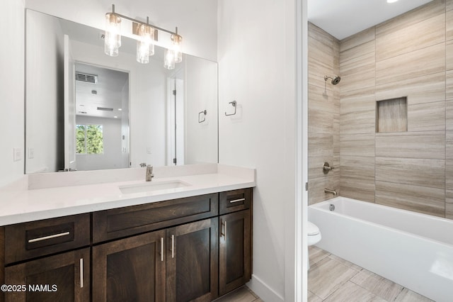 555 N Valerian Ln Lot 24, Flagstaff, AZ 86004 - bathroom with vanity, toilet, bathtub / shower combination, and baseboards