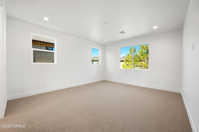 555 N Valerian Ln Lot 24, Flagstaff, AZ 86004 - empty room with light colored carpet, baseboards, and recessed lighting