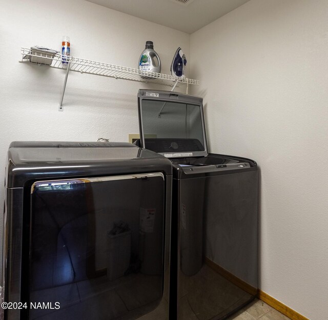 laundry area featuring washer and clothes dryer