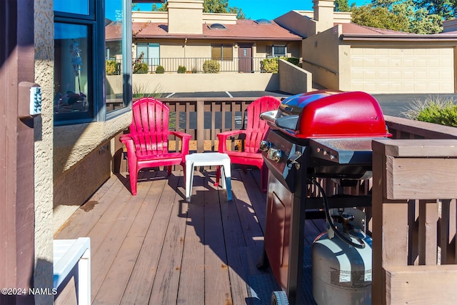 deck featuring a grill