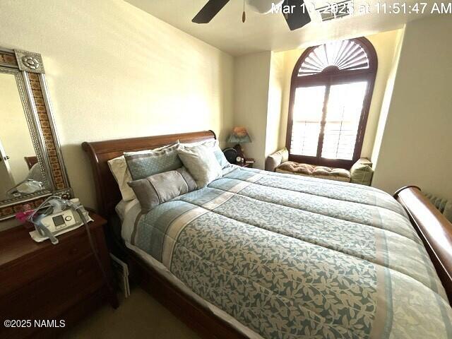 9123 W Arden Ln, Bellemont, AZ 86015 - bedroom with a ceiling fan