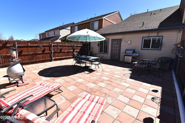 9123 W Arden Ln, Bellemont, AZ 86015 - view of patio / terrace with fence and outdoor dining space