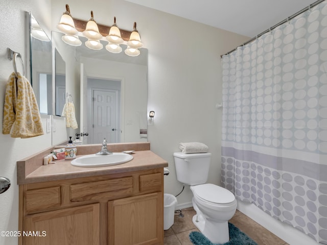 bathroom with a shower with shower curtain, toilet, vanity, and tile patterned flooring