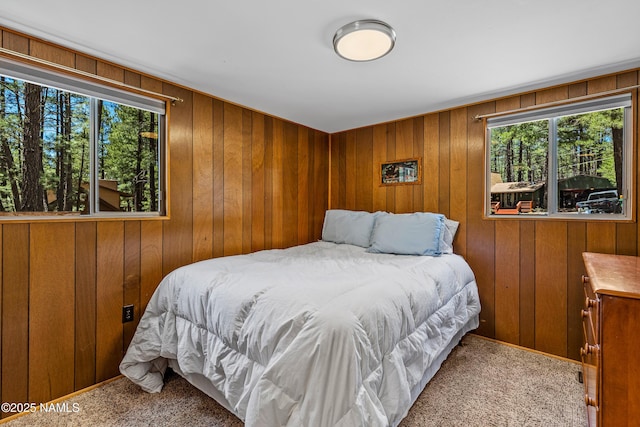 325 Lodge Dr, Munds Park, AZ 86017 - carpeted bedroom with multiple windows and wood walls