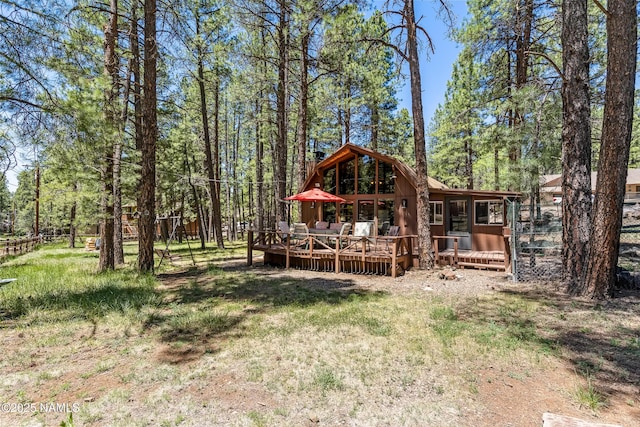 325 Lodge Dr, Munds Park, AZ 86017 - rear view of property featuring a deck and a lawn
