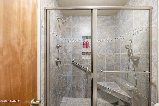 bathroom featuring an enclosed shower