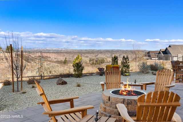 view of patio featuring a fire pit