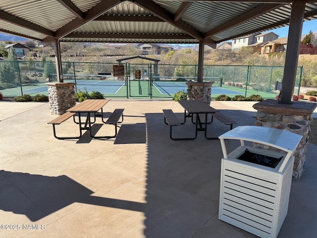 surrounding community featuring tennis court and a gazebo