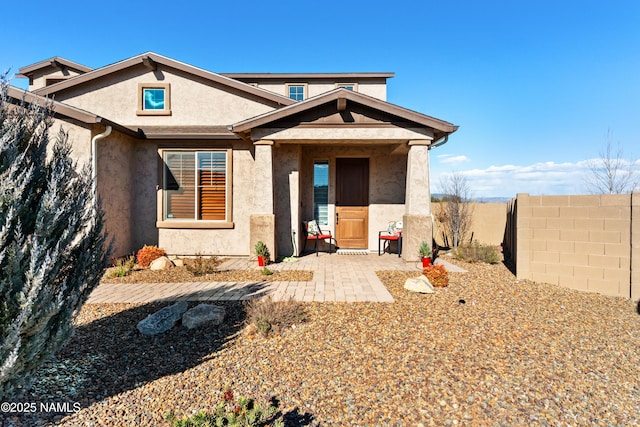 back of property with a patio area