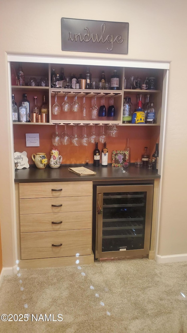 bar with carpet flooring and wine cooler