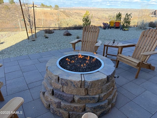 view of patio with an outdoor fire pit