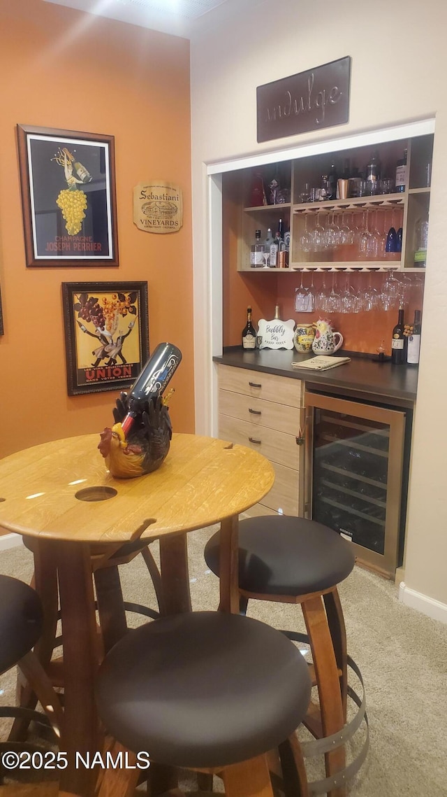 bar with carpet flooring and wine cooler