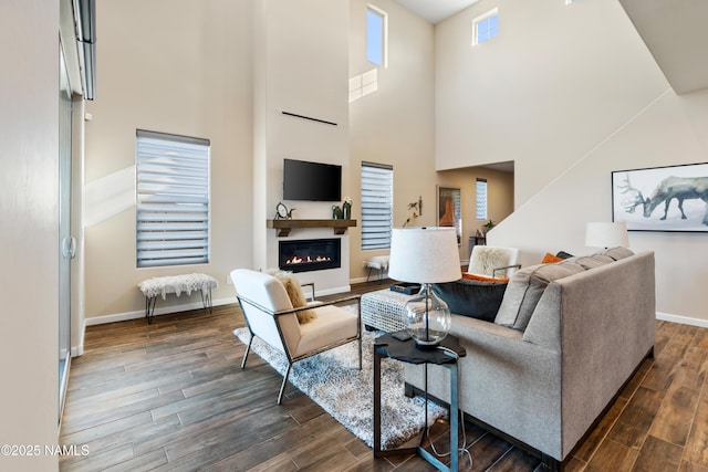 living room with a towering ceiling