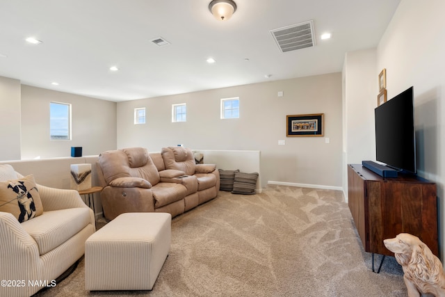 living room with light colored carpet