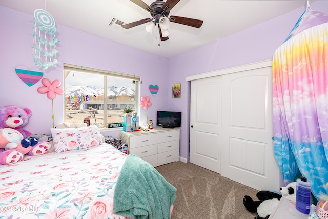 11265 N Zady Ln, Flagstaff, AZ 86004 - bedroom featuring light colored carpet, a closet, and a ceiling fan