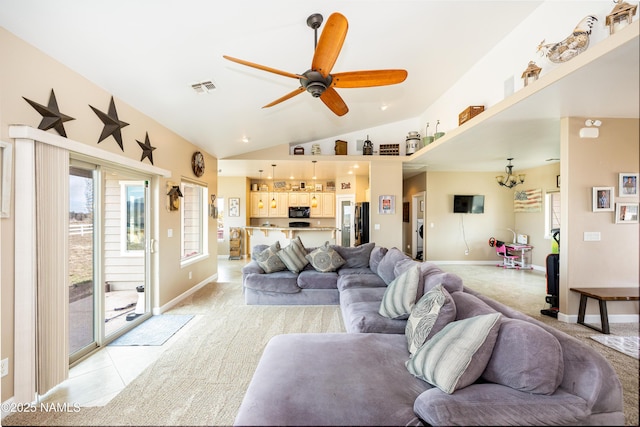 11265 N Zady Ln, Flagstaff, AZ 86004 - living area featuring a ceiling fan, light colored carpet, lofted ceiling, and baseboards