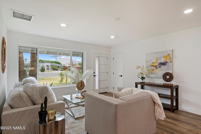 3707 E Amelia Ave, Phoenix, AZ 85018 - living room with wood finished floors and recessed lighting