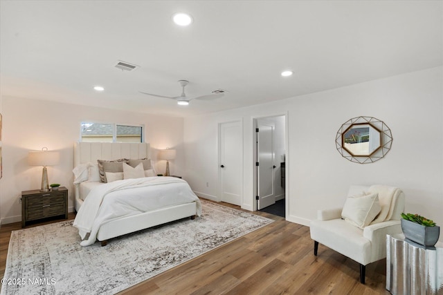 3707 E Amelia Ave, Phoenix, AZ 85018 - bedroom with wood finished floors, recessed lighting, and ceiling fan