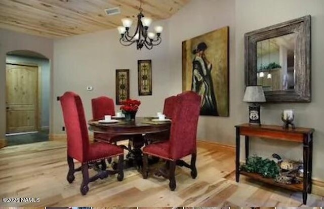 2163 S Highland Mesa Rd, Flagstaff, AZ 86001 - dining space with an inviting chandelier, wood ceiling, and light wood-type flooring