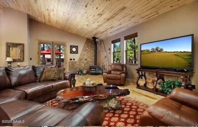 2163 S Highland Mesa Rd, Flagstaff, AZ 86001 - living room with a wood stove, wooden ceiling, and lofted ceiling