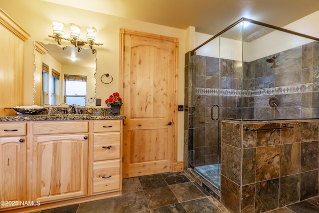 2163 S Highland Mesa Rd, Flagstaff, AZ 86001 - bathroom featuring a shower with door and vanity