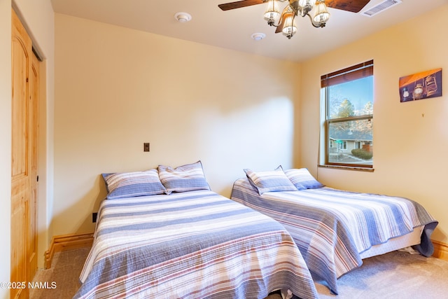 2163 S Highland Mesa Rd, Flagstaff, AZ 86001 - bedroom featuring a closet, ceiling fan, and carpet flooring
