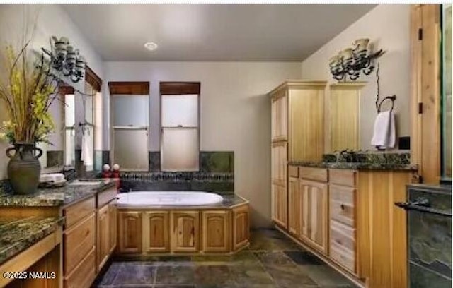 2163 S Highland Mesa Rd, Flagstaff, AZ 86001 - bathroom featuring sink and a bathing tub