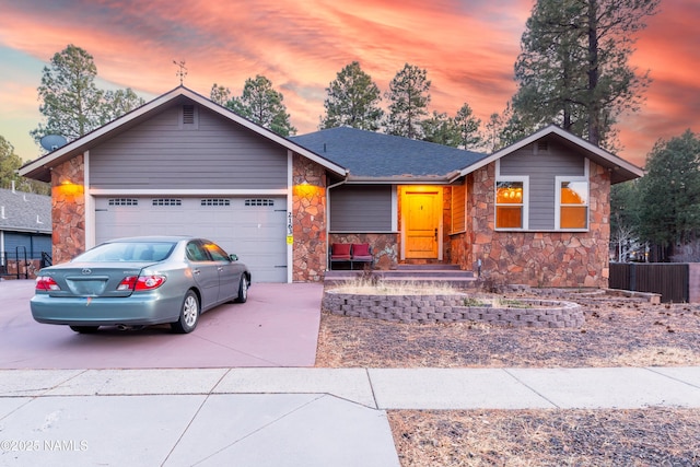 ranch-style home featuring a garage