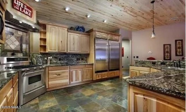 2163 S Highland Mesa Rd, Flagstaff, AZ 86001 - kitchen featuring appliances with stainless steel finishes, decorative light fixtures, dark stone counters, backsplash, and wooden ceiling