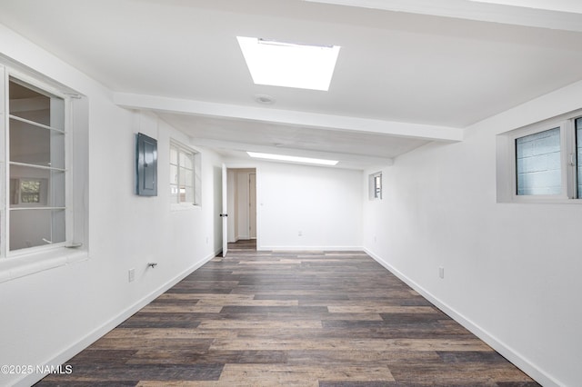 2814 N Patterson Blvd, Flagstaff, AZ 86004 - below grade area featuring dark wood finished floors, baseboards, and electric panel