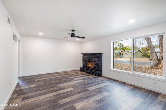 2814 N Patterson Blvd, Flagstaff, AZ 86004 - unfurnished living room featuring dark wood-style flooring, a fireplace, a ceiling fan, recessed lighting, and baseboards