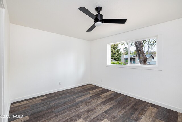 2814 N Patterson Blvd, Flagstaff, AZ 86004 - empty room featuring dark wood-type flooring and baseboards