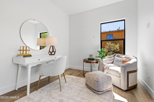 302 W Oak Ave Unit 5, Flagstaff, AZ 86001 - sitting room featuring baseboards and wood finished floors