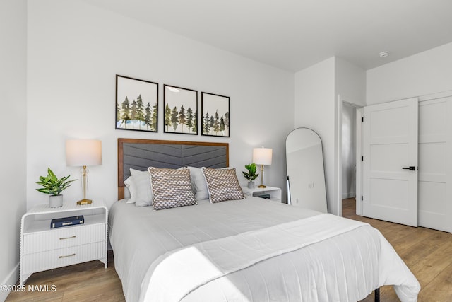 302 W Oak Ave Unit 5, Flagstaff, AZ 86001 - bedroom with wood finished floors