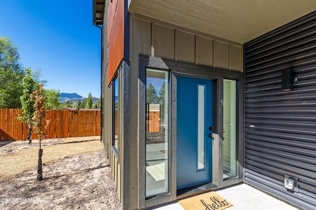 302 W Oak Ave Unit 5, Flagstaff, AZ 86001 - doorway to property featuring a mountain view and board and batten siding