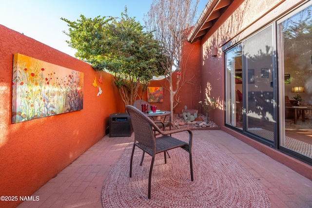 view of patio / terrace with fence