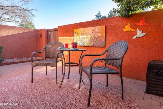 view of patio featuring heating unit