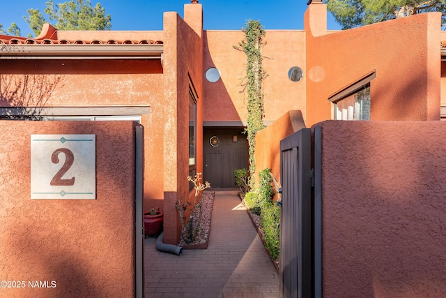 exterior space with stucco siding