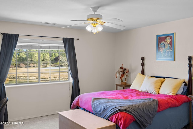 bedroom featuring ceiling fan and carpet floors