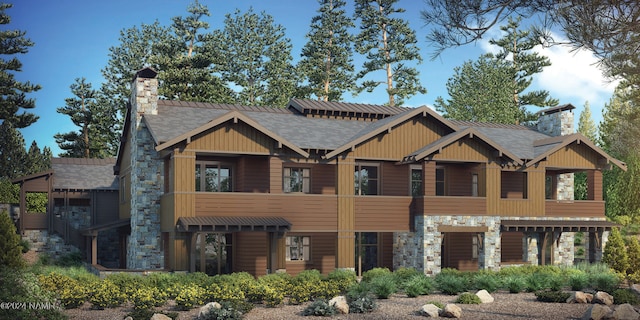 view of front of home featuring a balcony