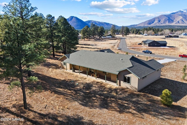 drone / aerial view featuring a mountain view