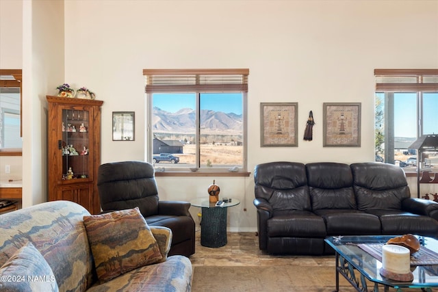 living room with a mountain view and plenty of natural light