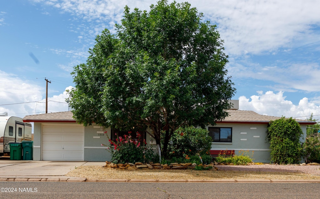 view of front of home featuring a garage