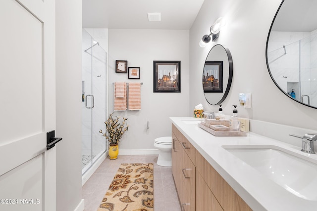 bathroom with toilet, tile patterned flooring, an enclosed shower, and vanity