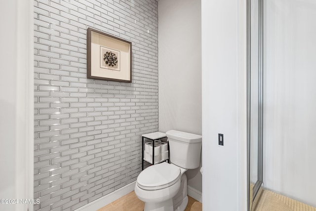 bathroom featuring toilet